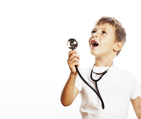 Image showing little cute boy with stethoscope playing like adult profession d