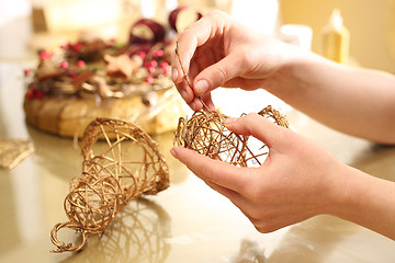 Image showing Christmas tree toy bells braided sticks 