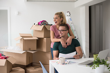 Image showing Young couple moving in a new home