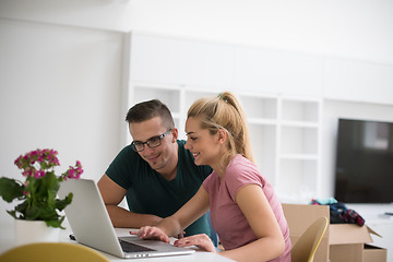 Image showing Young couple moving in a new home