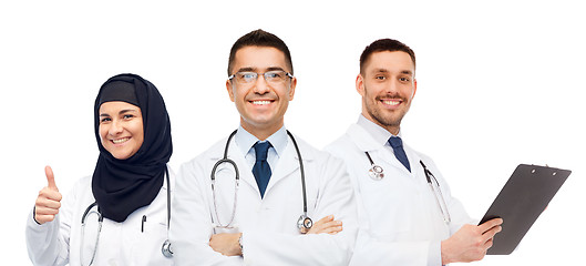 Image showing happy doctors with stethoscopes showing thumbs up