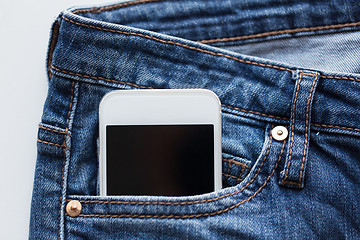 Image showing smartphone in pocket of denim pants or jeans