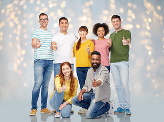 Image showing international group of people showing thumbs up