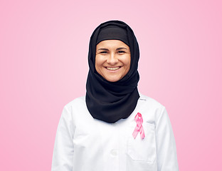 Image showing muslim doctor with breast cancer awareness ribbon