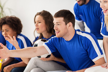 Image showing friends or football fans watching soccer at home