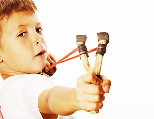 Image showing little cute angry real boy with slingshot isolated