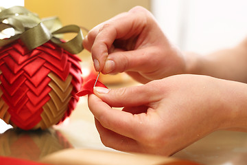 Image showing How to make Christmas ornaments with ribbons?