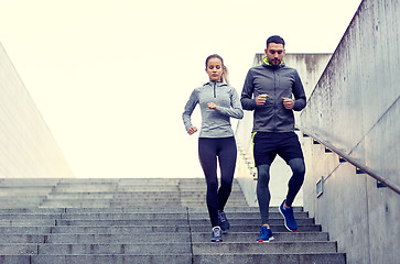 Image showing couple walking downstairs on stadium