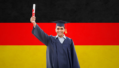 Image showing happy male student with diploma  over german flag