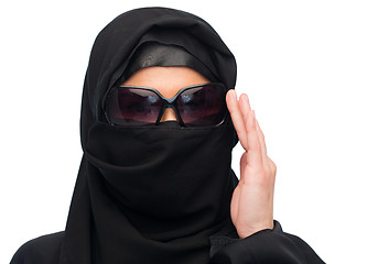 Image showing muslim woman in hijab and sunglasses over white