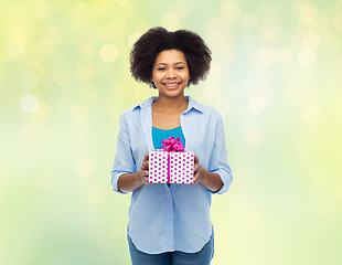 Image showing happy african woman with birthday gift box