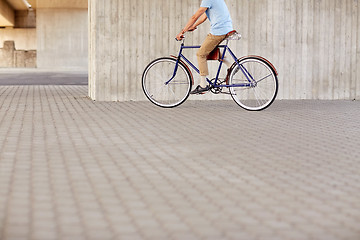 Image showing hipster man riding fixed gear bike