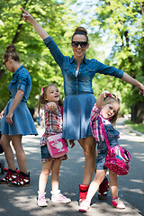 Image showing mother with her daughters in the park