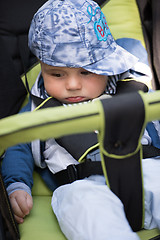Image showing baby boy sitting in the pram