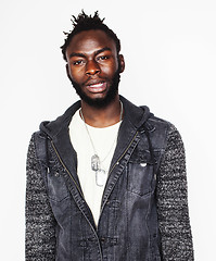 Image showing young handsome african american boy smiling emotional isolated on white background, in motion gesturing smiling, lifestyle people concept 