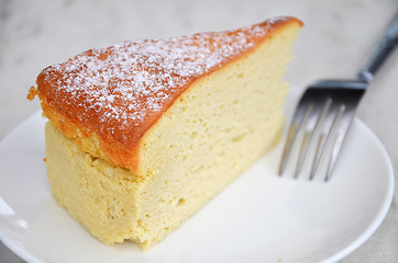 Image showing Yellow cheese cake on table 