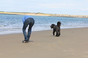 Image showing Woman and dog 