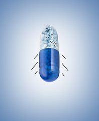 Image showing Blue capsules and pills background