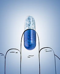 Image showing Blue capsules and pills background