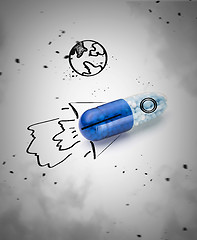 Image showing Blue capsules and pills background