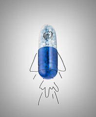 Image showing Blue capsules and pills background