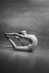 Image showing The female ballet dancer posing over gray background