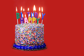 Image showing Birthday Celebration Candles on Red Background