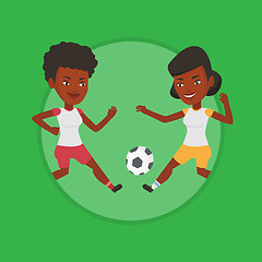 Image showing Two female soccer players fighting for ball.