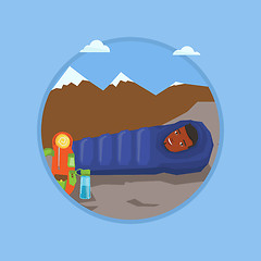 Image showing Man sleeping in sleeping bag in the mountains.