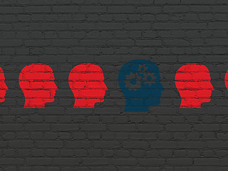 Image showing Business concept: head with gears icon on wall background