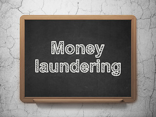 Image showing Currency concept: Money Laundering on chalkboard background