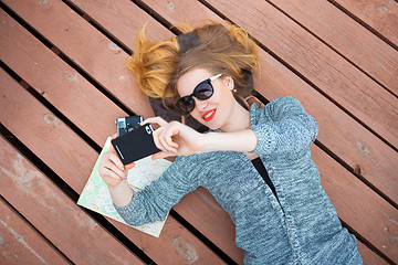 Image showing Woman with cellphone taking photo