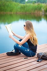 Image showing Young traveler searching road