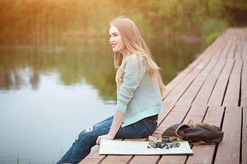 Image showing Pretty young woman traveling