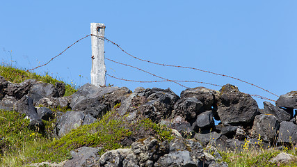 Image showing Barrier with barbed wire