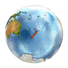 Image showing New Zealand in red on full Earth