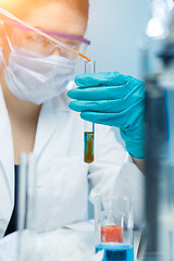 Image showing Young lab with chemical substances