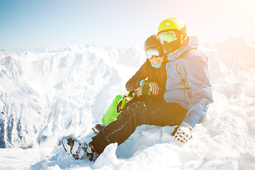 Image showing Couple hugging among winter mountain