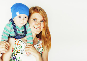 Image showing young beauty mother with cute baby, red head happy modern family