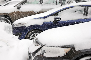 Image showing Snowstorm at city car park