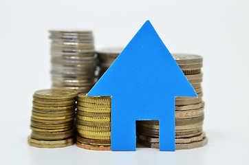 Image showing House model and stacks of coins