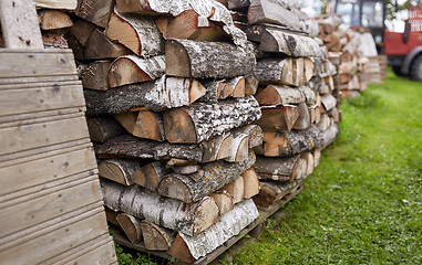 Image showing stack of firewood on farm at country