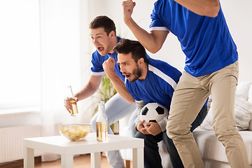 Image showing friends or football fans watching soccer at home