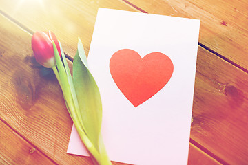 Image showing close up of flowers and greeting card with heart