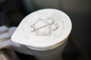 Image showing washer tank cap in car