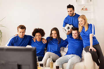 Image showing friends or football fans watching soccer at home