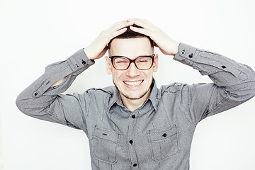 Image showing young handsome well-groomed guy posing emotional on white background, lifestyle people concept