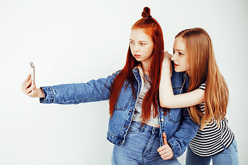 Image showing best friends teenage girls together having fun, posing emotional on white background, besties happy smiling, lifestyle people concept 