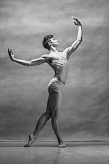 Image showing The male ballet dancer posing over gray background