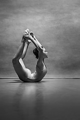 Image showing The female ballet dancer posing over gray background